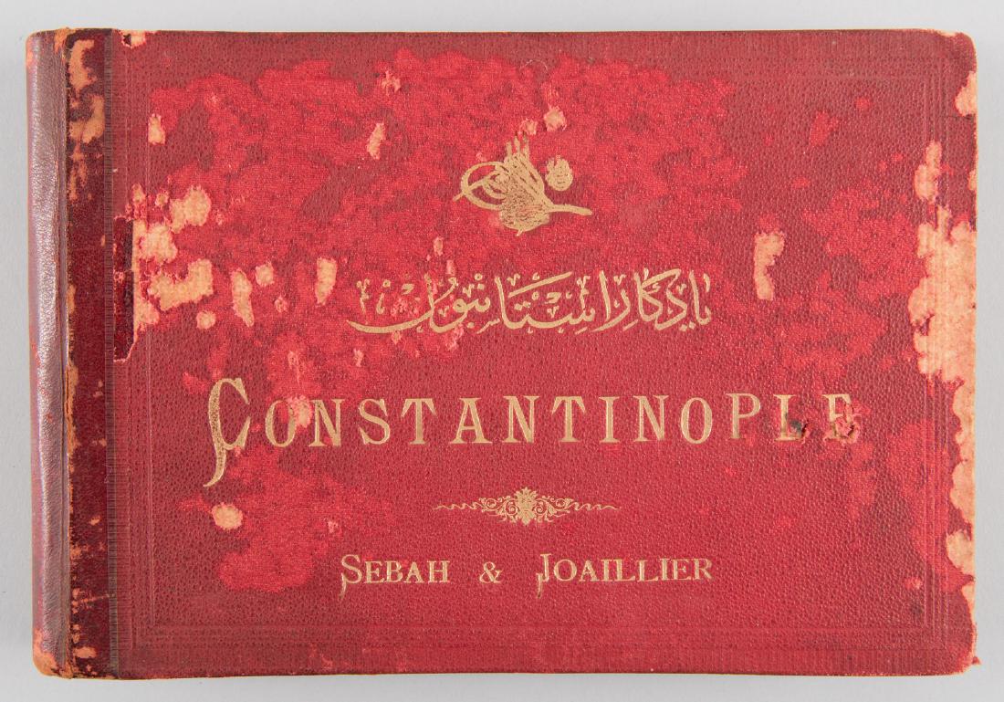 Constantinople Book, Sebah Joaillier Album: SEBAH, J. Pascal and JOAILLIER, Polycarpe. Constantinople. Published by Sebah & Joallier, Constantinople, circa 1890. Oblong quarto, original pebbled red cloth with gilt lettering on cover, accordion-