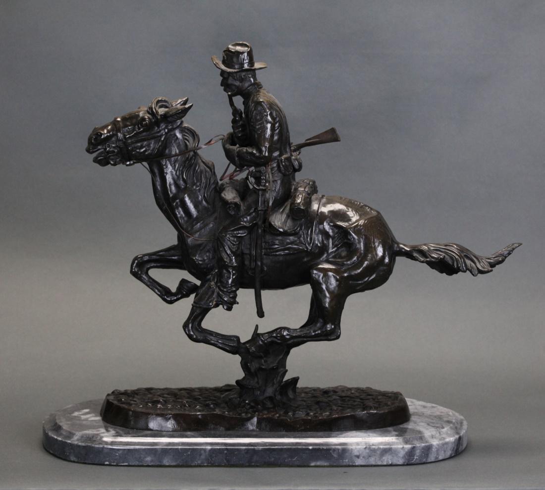 bronze sculpture of a horse and rider (1 of 4)