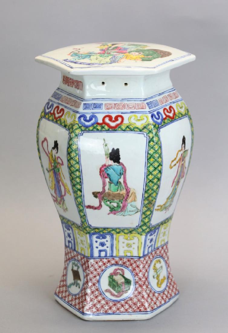 Chinese porcelain garden seat: decorated with female immortals; 17.5in(H) x 9in(L) x 9in(W)