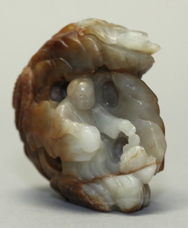 Chinese jade boulder carving w/ figure motif (1 of 4)