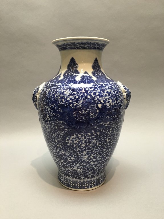Chinese blue & white porcelain vase, Qing dynasty: decorated with gnarled branches and leaves, dragon motif, mark on bottom, 13.3in(H) x 9in(L); Notice to bidders: Measurements and weights are approximate. Condition reports and additional photographs 