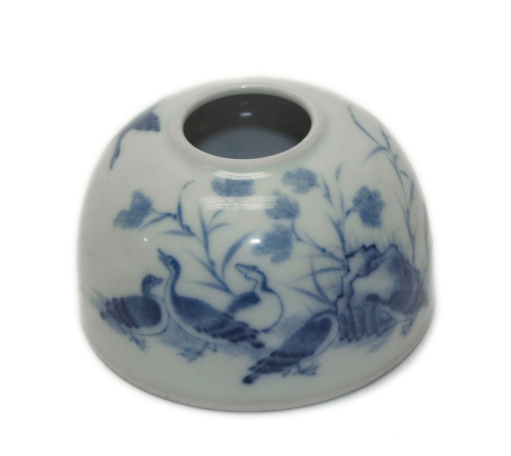 Chinese blue and white porcelain water dropper: duck motif, 2.17in(H) x 3.11in(diameter of base); Notice to bidders: Measurements and weights are approximate. Condition reports and additional photographs are provided upon request. Condition reports