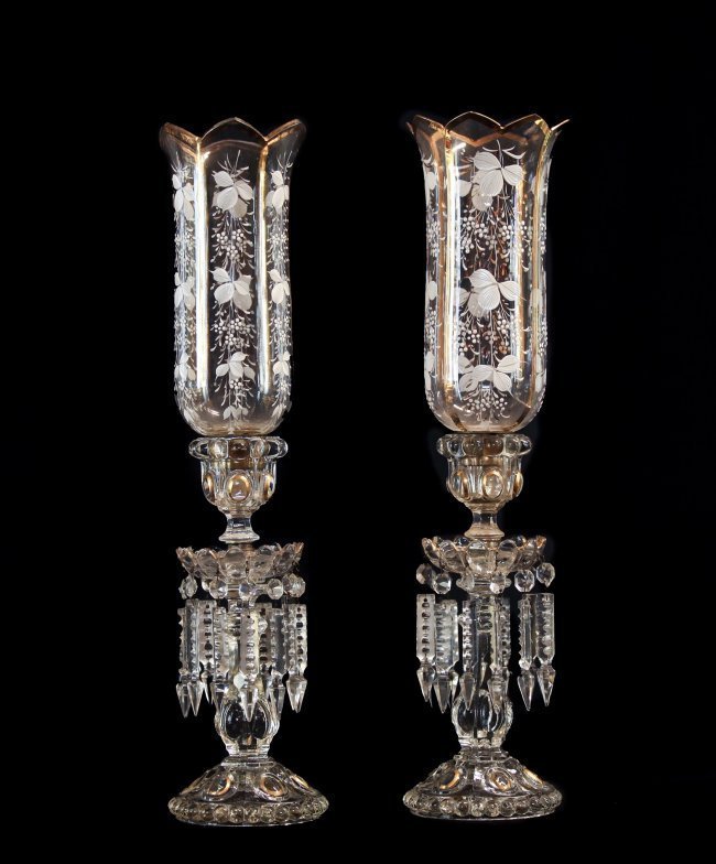 A PAIR OF BACCARAT CANDELABRA (1 of 2)