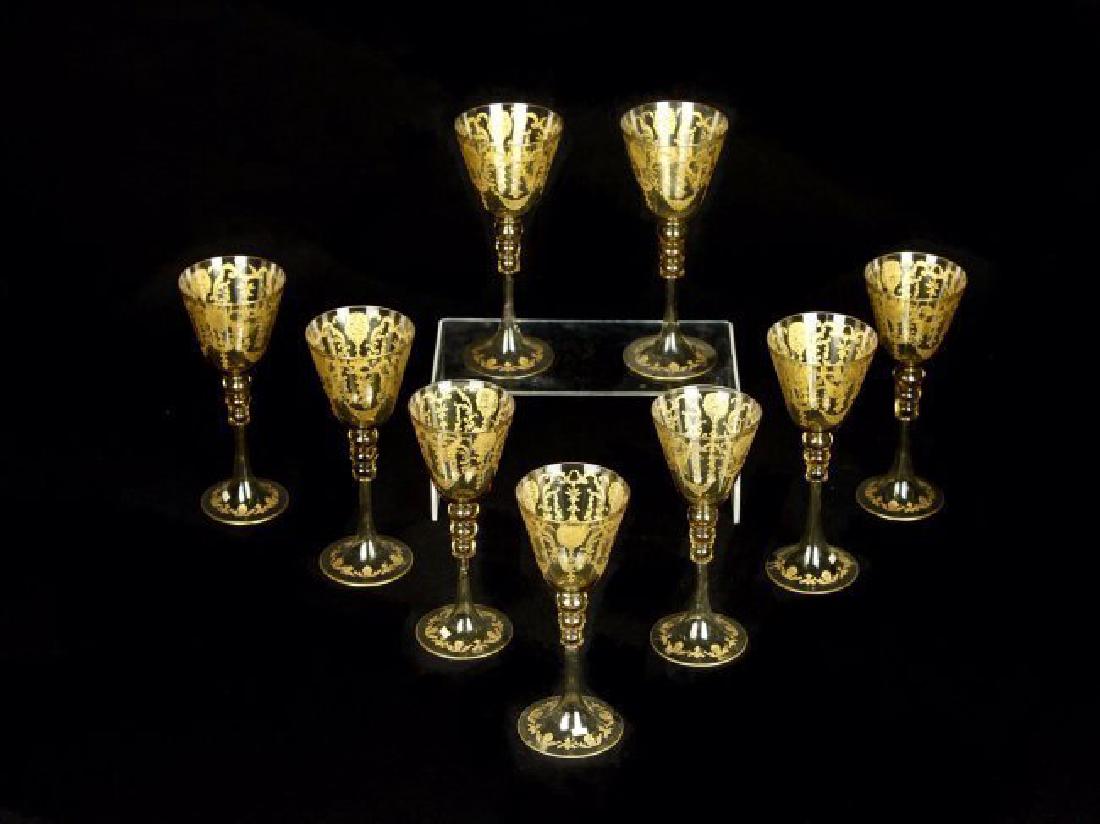 A SET OF 9 GILT MURANO CHAMPAGNE GLASSES: Circa 1920. Measuring 8" H. All in excellent condition. Estimate $1.000-1.200