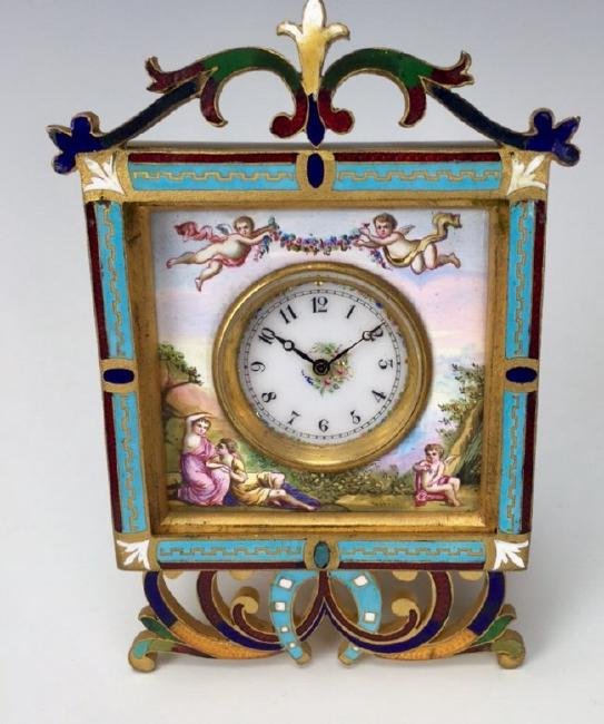 A FRENCH GILT BRONZE  ENAMEL CLOCK (1 of 1)