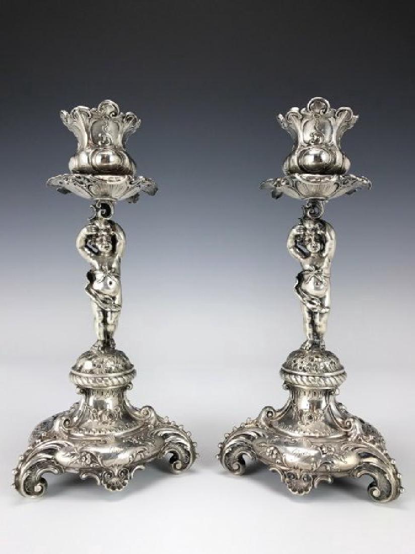 AN IMPOSING PAIR OF CONTINENTAL SILVER CANDEL HOLDERS (1 of 4)