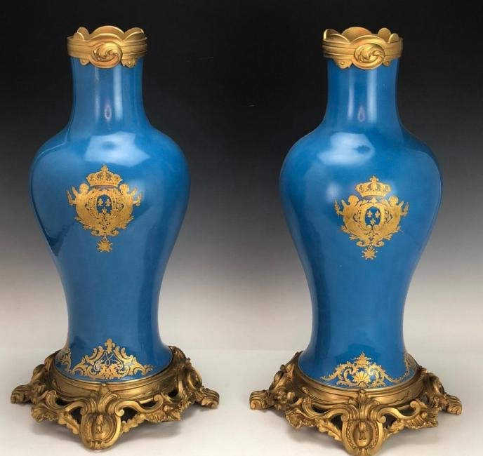 A LARGE PAIR OF 19TH C. ORMOLU MOUNTED SEVRES VASES: Measures 20" High. Estimate $2.000-2.500