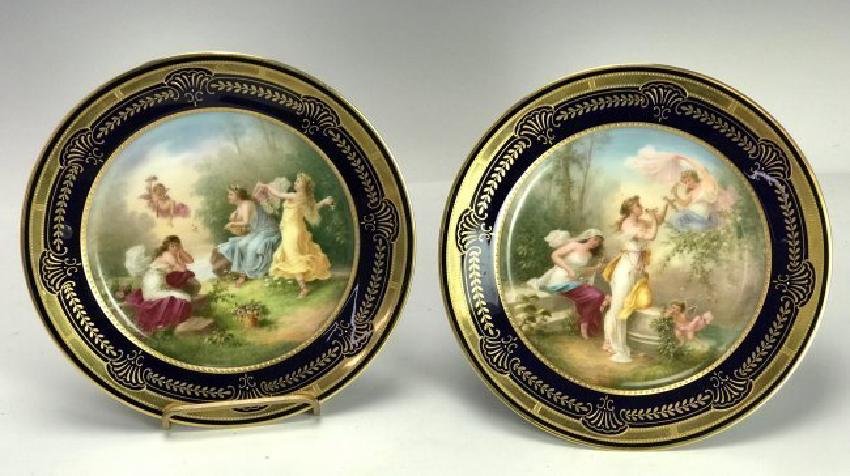 PAIR OF ROYAL VIENNA FOOTED CAKE STANDS CIRCA 1900: Measure 8" D. , 6.5" H. Excellent condition. Estimate $800-1.000