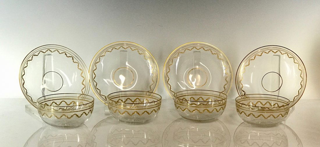 SET OF 4 GILT MOSER FINGER BOWL AND PLATES: Circa 1900. Plates measure 6.5" D. Excellent condition. Estimate $600-800