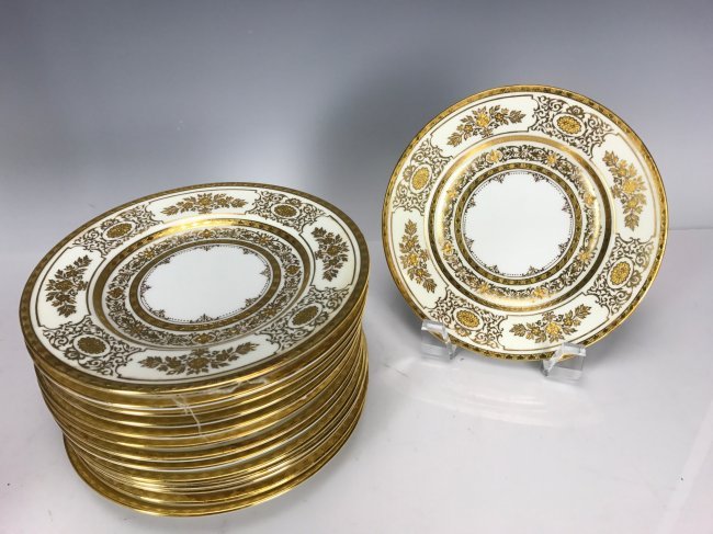SET OF 14 GILT DECORATED TIFFANY MINTON BREAD PLATES: Measure 6" D. All in good condition. Estimate $800-1.000