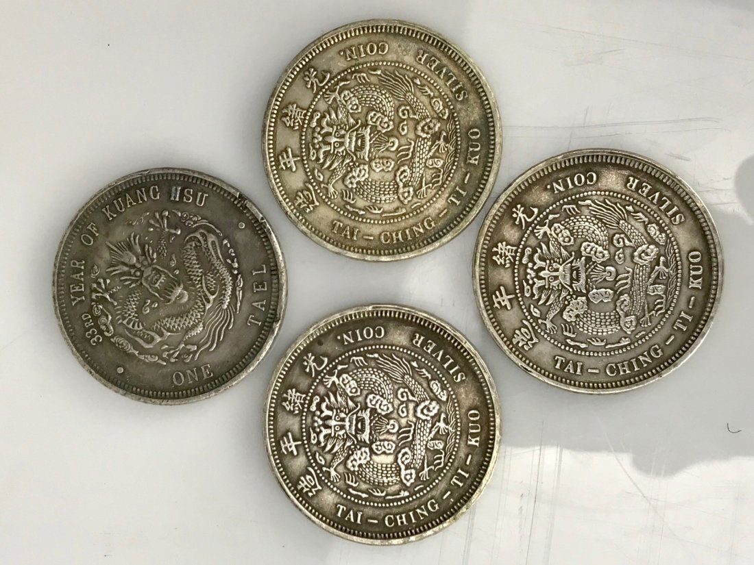 4 CHINESE SILVER COINS (1 of 2)