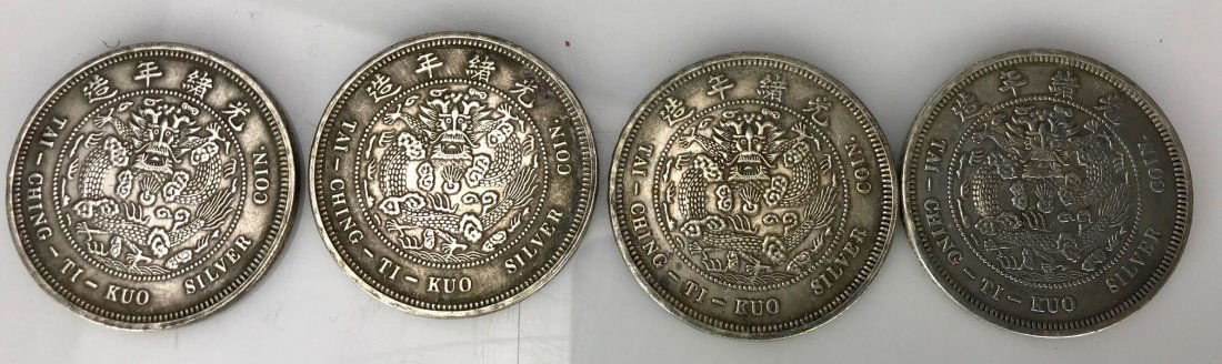 4 ANTIQUE CHINESE SILVER COINS (1 of 2)