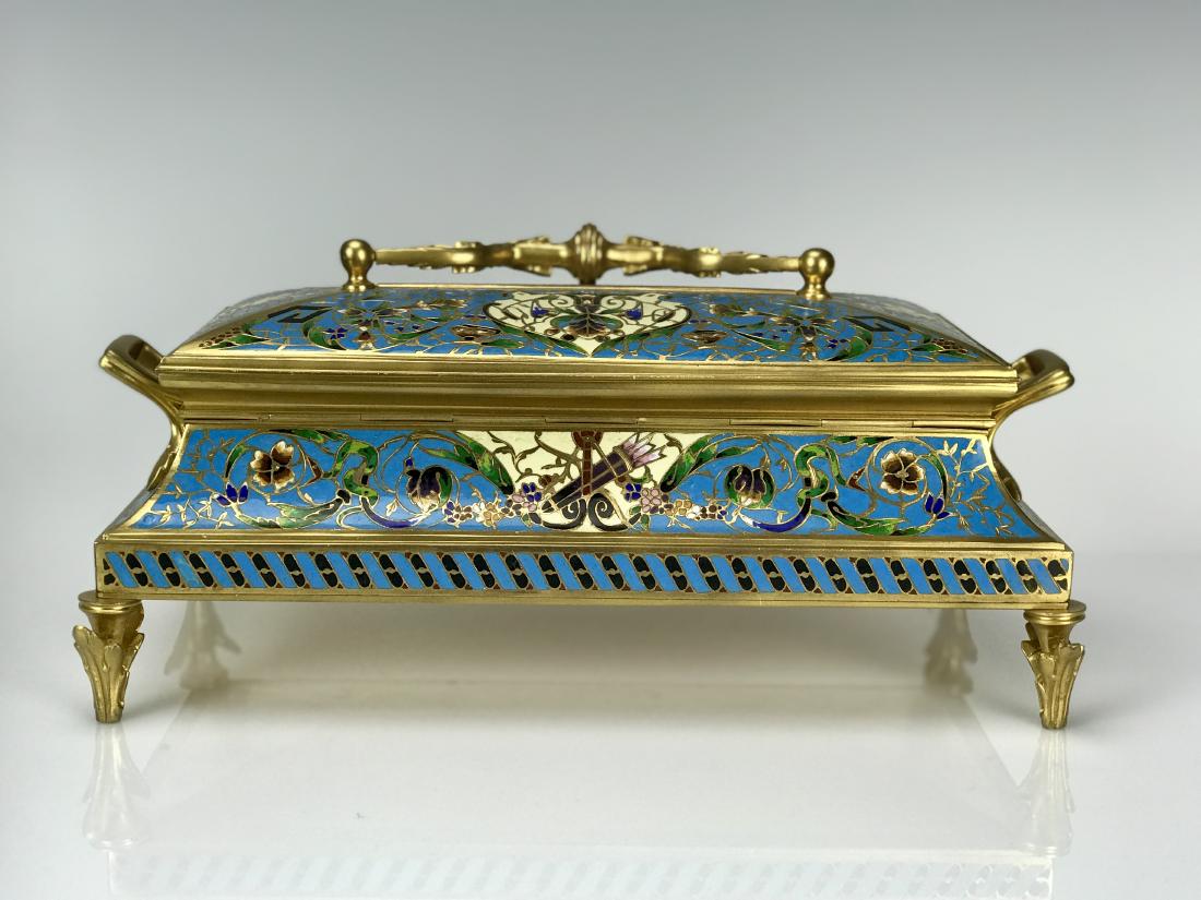 A LARGE 19TH C. CHAMPLEVE ENAMEL JEWLRY BOX: Measures 12.5" x 6.5". Excellent condition. Estimate $2.000-2.500