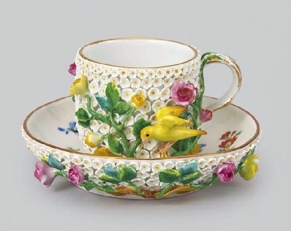 19TH CENTURY MEISSEN SNOWBALL CUP AND SAUCER: A 19th century Meissen Snowball cup and saucer, cross swords marks . Estimate $1.500-2.000
