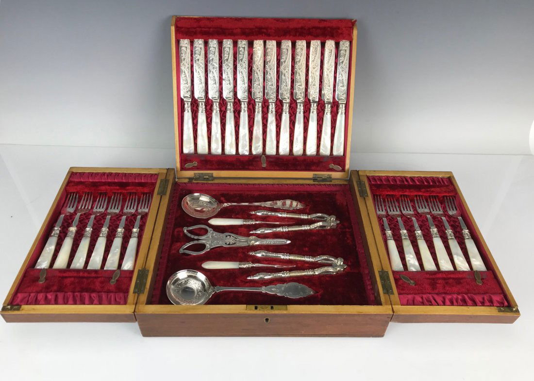 BOXED SILVER PLATED & MOTHER OF PEARL DESSERT SET: All marked. Circa 1900. Good condition. Estimate $800-1.000