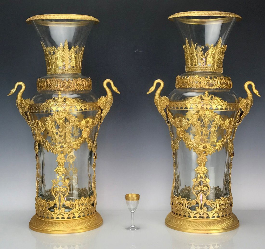 A PALATIAL PAIR OF ORMOLU MOUNTED BACCARAT VASES