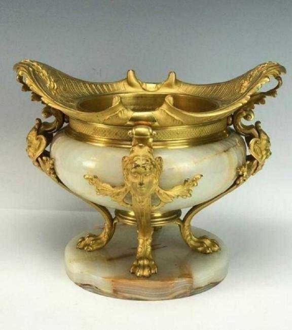 19TH C. BRONZE AND ONYX CENTERPIECE: Circa 1850. Measures 12.5" L. ,10" High. Excellent condition. Estimate $2.500-3.000