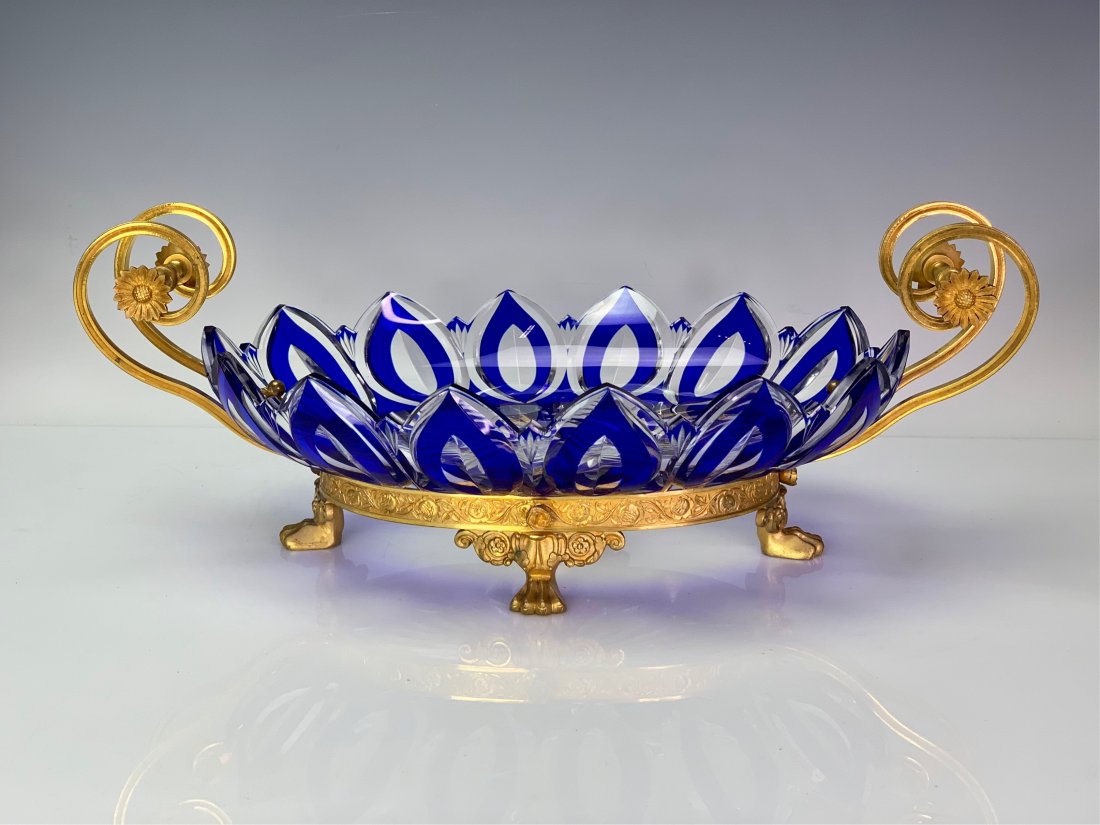 DORE BRONZE AND BACCARAT GLASS CENTERPIECE: Circa 1900. Measures 17.5" Long 6.5" High. Excellent condition. Estimate $1.000-1.200