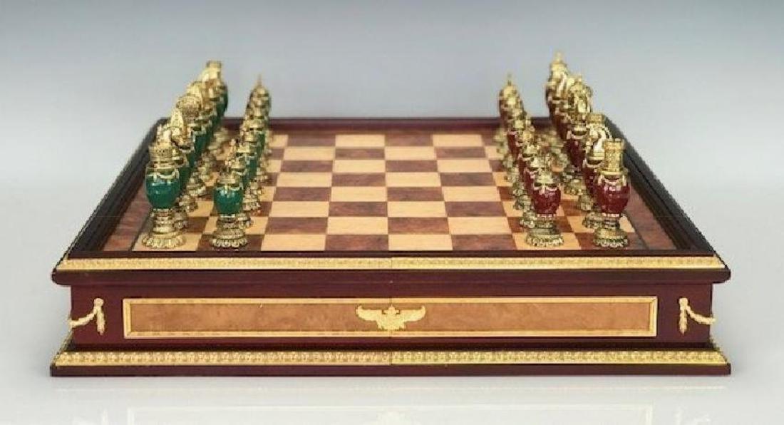 IMPERIAL FABERGE JEWELED CHESS SET: consisting of green and burgundy jeweled body chess set with 24k gold plated headpieces, inspired by the jeweled eggs of FabergÃƒÂ© produced by the Franklin Mint and designed by The House of Faber