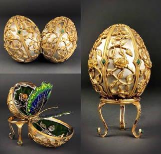 FABERGE 24KT GOLD OVER STERLING SILVER BUTTERFLY EGG: Gold over silver, inset with precious stones. Included is a surprise 18kt gold bug pin. Estimate $4.000-5.000