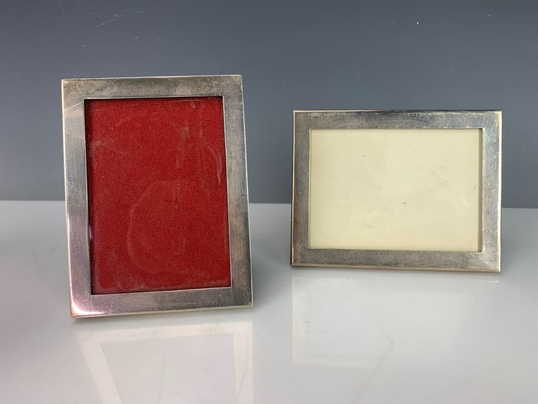 2 STERLING SILVER PICTURE FRAMES: Dimension 5"x 3". Both marked Sterling, one is Gotham. Estimate $200-250