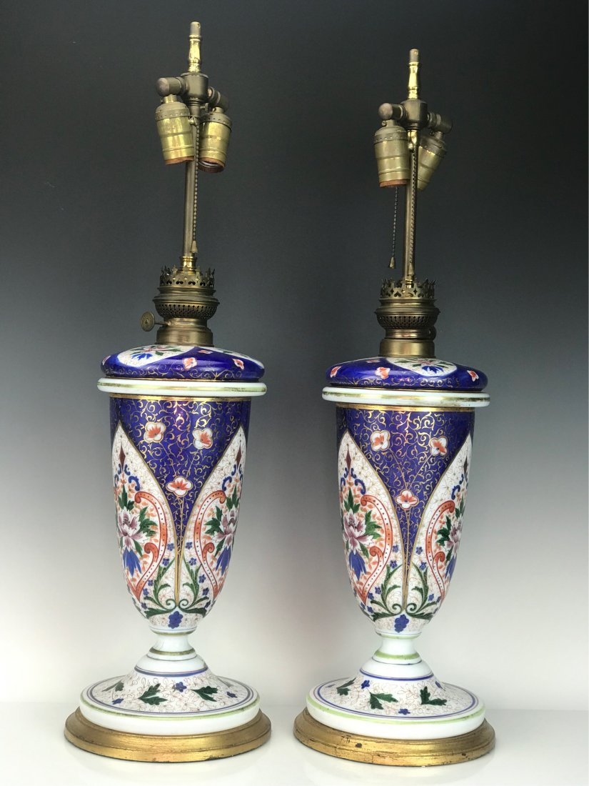 VERY FINE PAIR OF FRENCH OPALINE LAMPS: Circa 1880. Measures 18" to top of oil burner. Estimate $1.000-1.200