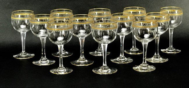 SET OF 12 GILT MOSER WINE GLASSES: Circa 1900. All in good condition. Estimate $300-400