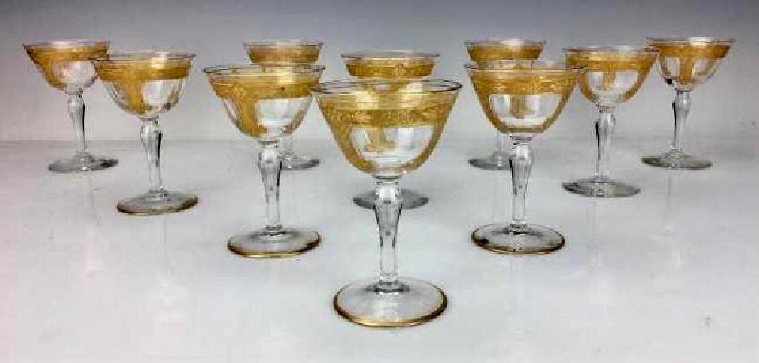 SET OF 12 SAINT LOUIS GILT WINE GLASSES: All in good condition. Estimate $600-800