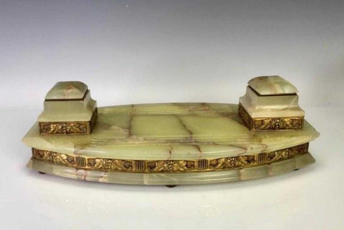 TIFFANY & CO ORMOLU MOUNTED ONYX INKWEL: Circa 1900. Signed Tiffany Studios. Measures 22" L. Estimate $800-1.000