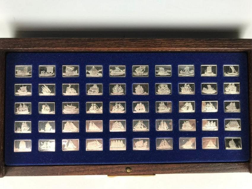 FRANKLIN MINT SILVER IGNOTS OF GREATEST SAILING SHIPS: In original box. Estimate $500-600