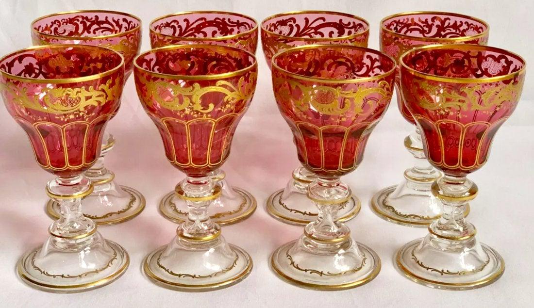 SET OF 8 GILT AND ENAMELED MOSER WINE GLASSES: Circa 1900. All in good condition. Measure 5.5 inches high. Estimate $800-1.000