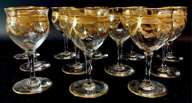 SET OF 12 GILT SAINT LOUIS WINE GLASSES: Circa 1900. Measure 6.5 inches high. All in good condition. Estimate $600-800