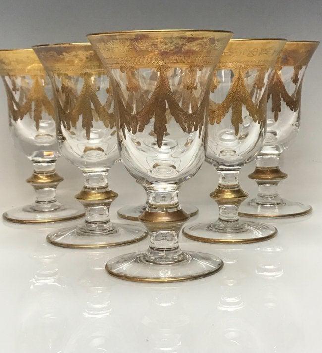 SET OF 6 SAINT LOUIS GILT WINE GLASSES: Measure 6.5 inches high .All in good Antique condition, minor gold loss. Estimate $600-800