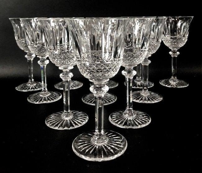12 SAINT LOUIS TOMMY CUT CRYSTAL WINE GLASSES: Measure 6 inches high. One still has the factory lable. Excellent condition. Estimate $800-1.000