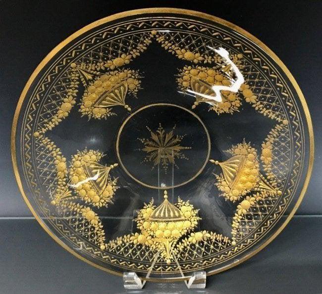 A LARGE GILT INTAGLIO CUT MOSER DISH: Circa 1900. Measures 13" D. Excellent condition. Estimate $500-600