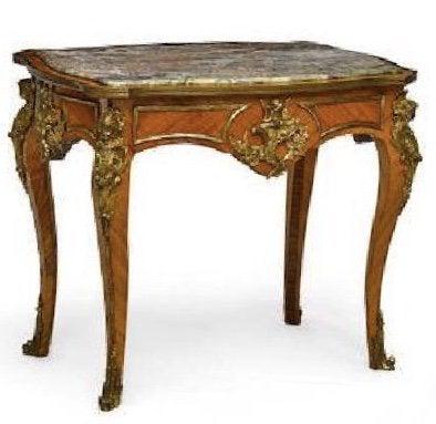LOUIS XV STYLE MARBLE TOP ORMOLU MOUNTED TABLE: Dimensions : height 31in (79cm); width 36in (91.5cm); depth 25 1/2in (64.5cm) .Estimate $2.000-3.000