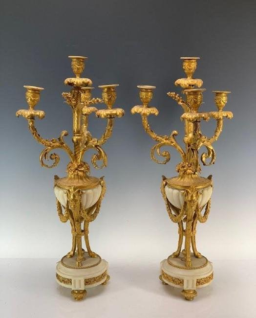PAIR OF LOUIS XVI STYLE ORMOLU MOUNTED MARBLE CANDELARA: Circa 1880. Measure 24" High. Estimate $1.500-2.000