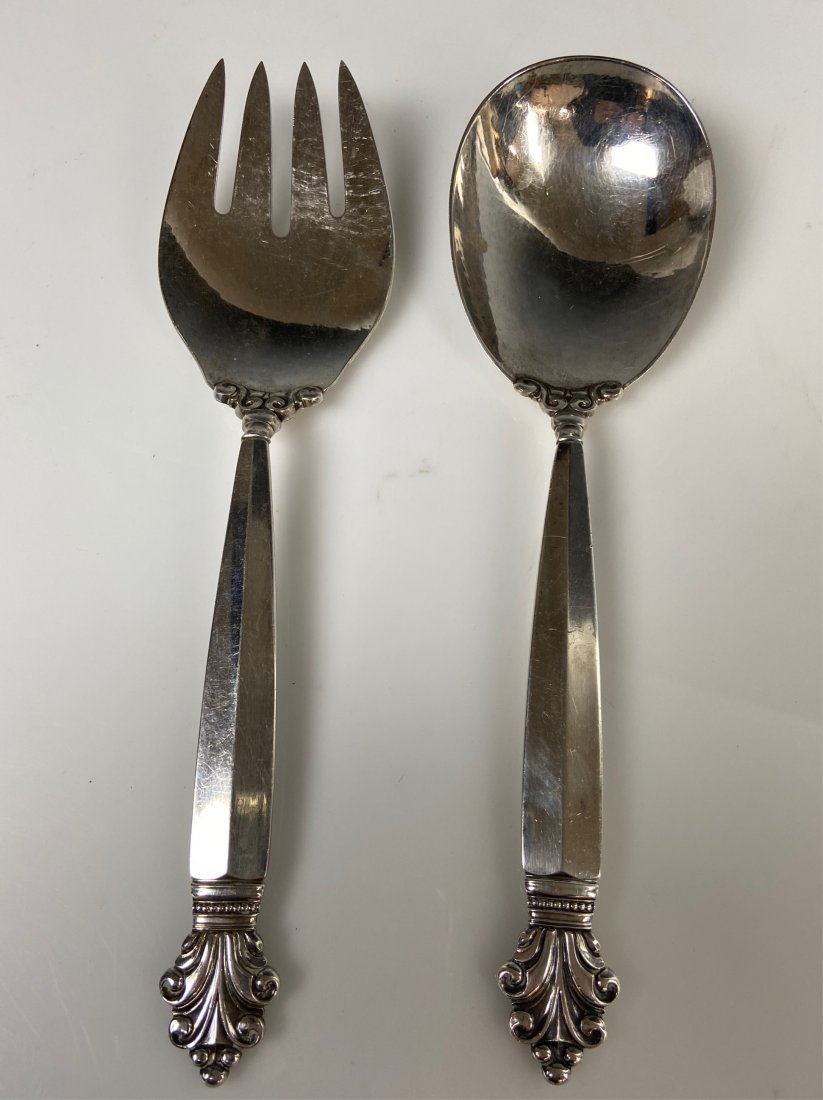 DANISH GEORGE JENSEN STERLING SALAD FORK & SPOON: Marked sterling silver , Denmark. Measure 10 “. Estimate $800-1.000