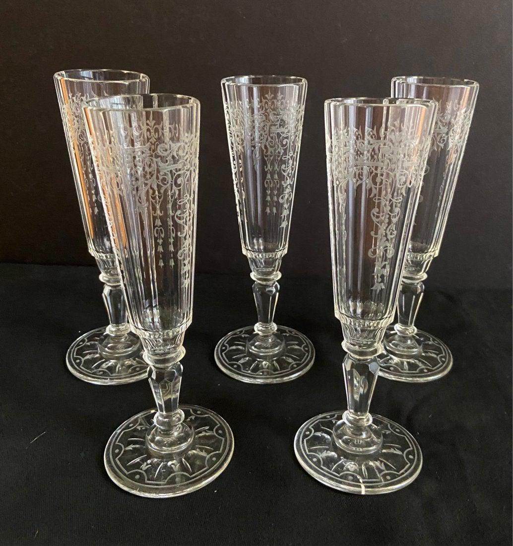 SET OF 5 SIGNED LOBMEYR CHAMPAGNE GLASSES: Circa 1900. Measures 7 inches high. All signed. All in good condition. Estimate $600-800