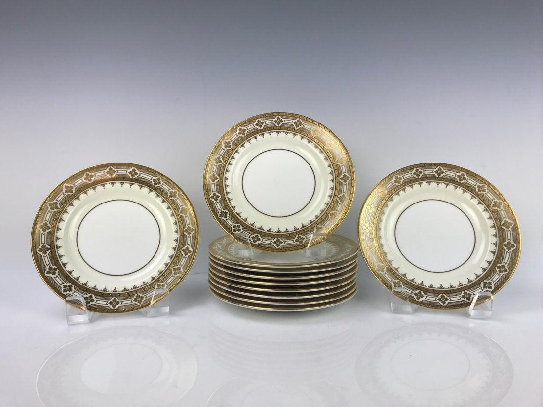 SET OF 11 MINTON GILT PLATES RETAILED BY TIFFANY: Measure 6.5 inches diameter. All in good condition. Estimate $1000-1.200