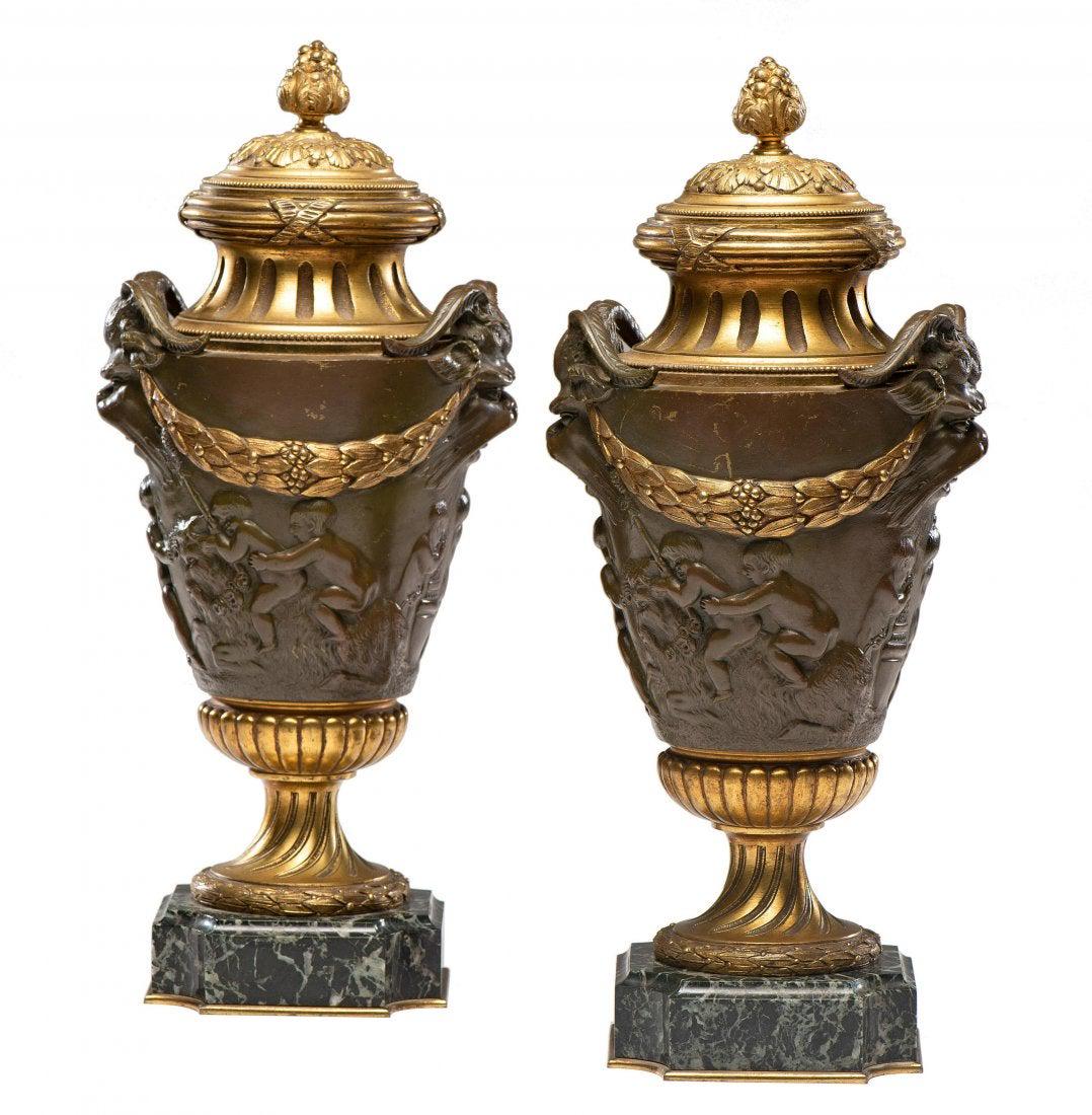 A PAIR OF LOUIS XV STYLE GILT AND PATINATED BRONZE URNS (1 of 2)