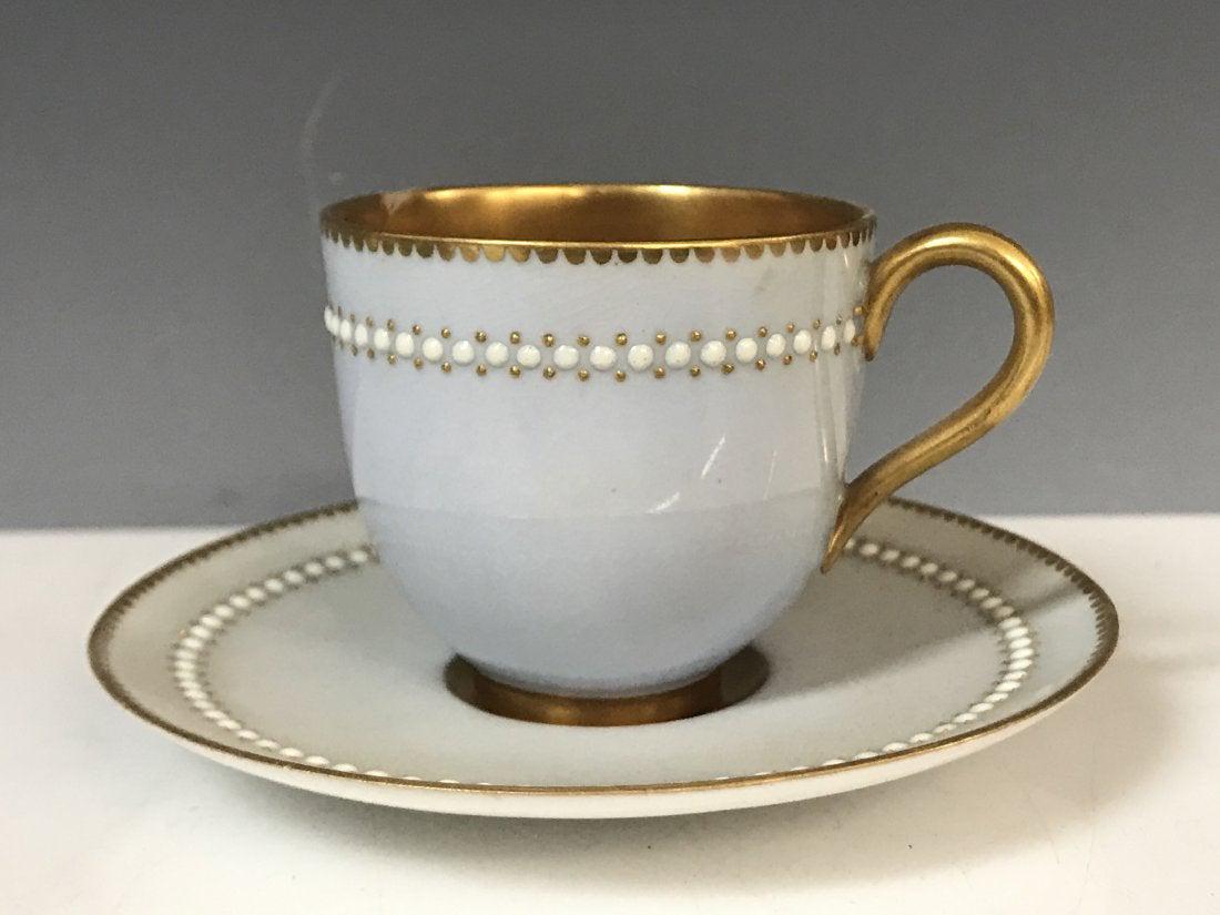 ANTIQUE ROYAL WORCESTER JEWELED DEMITASSE CUP: Circa 1920. Good condition. Estimate $200-300