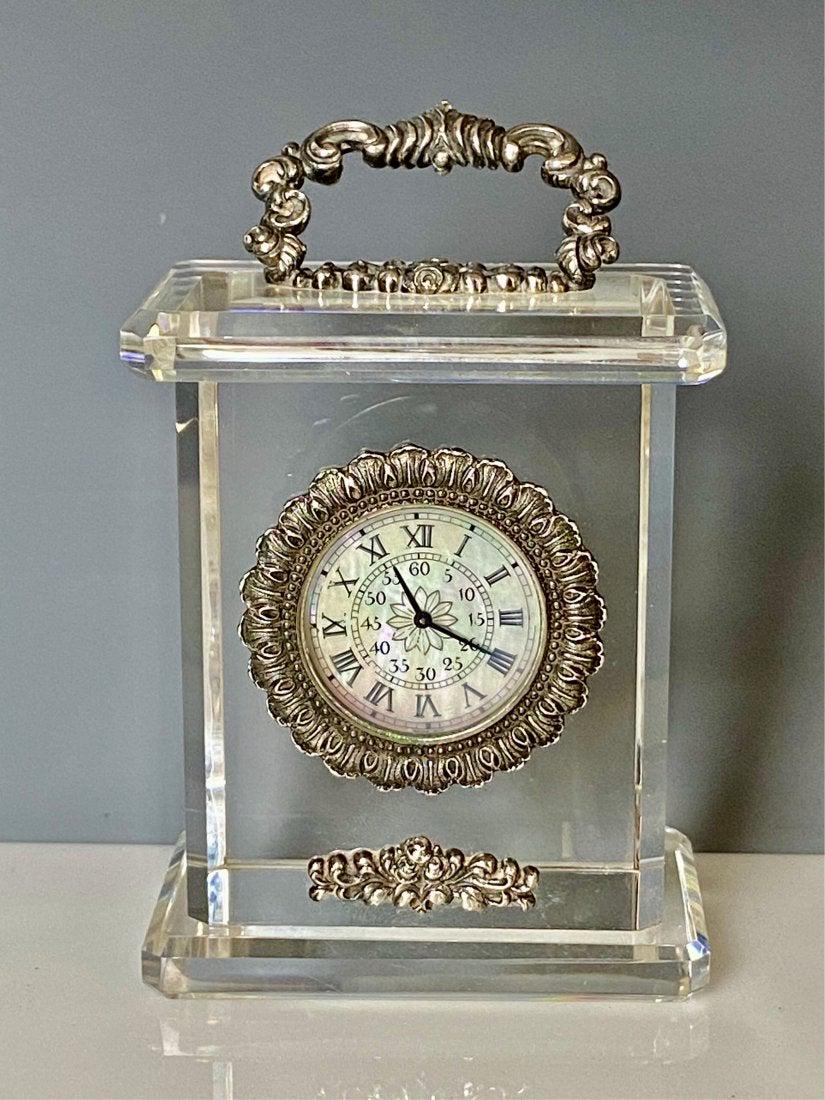 A BUCCELLATI STERLING SILVER AND CRYSTAL CLOCK.: Measures 6 inches high. Marked and numbered. Estimate $1.500-2.000
