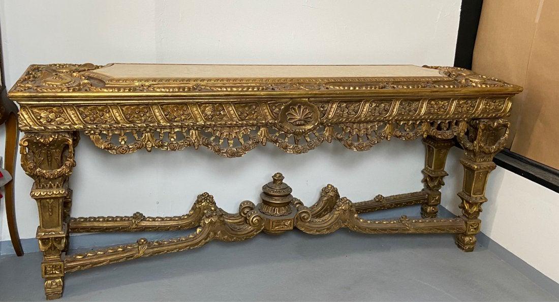 A LARGE GILT WOOD & GESSO MARBLE TOP CREDENZA: Measures 78 inches long , 20 inches wide, 33 inches high. Overall good condition. Estimate $3.000-4.000