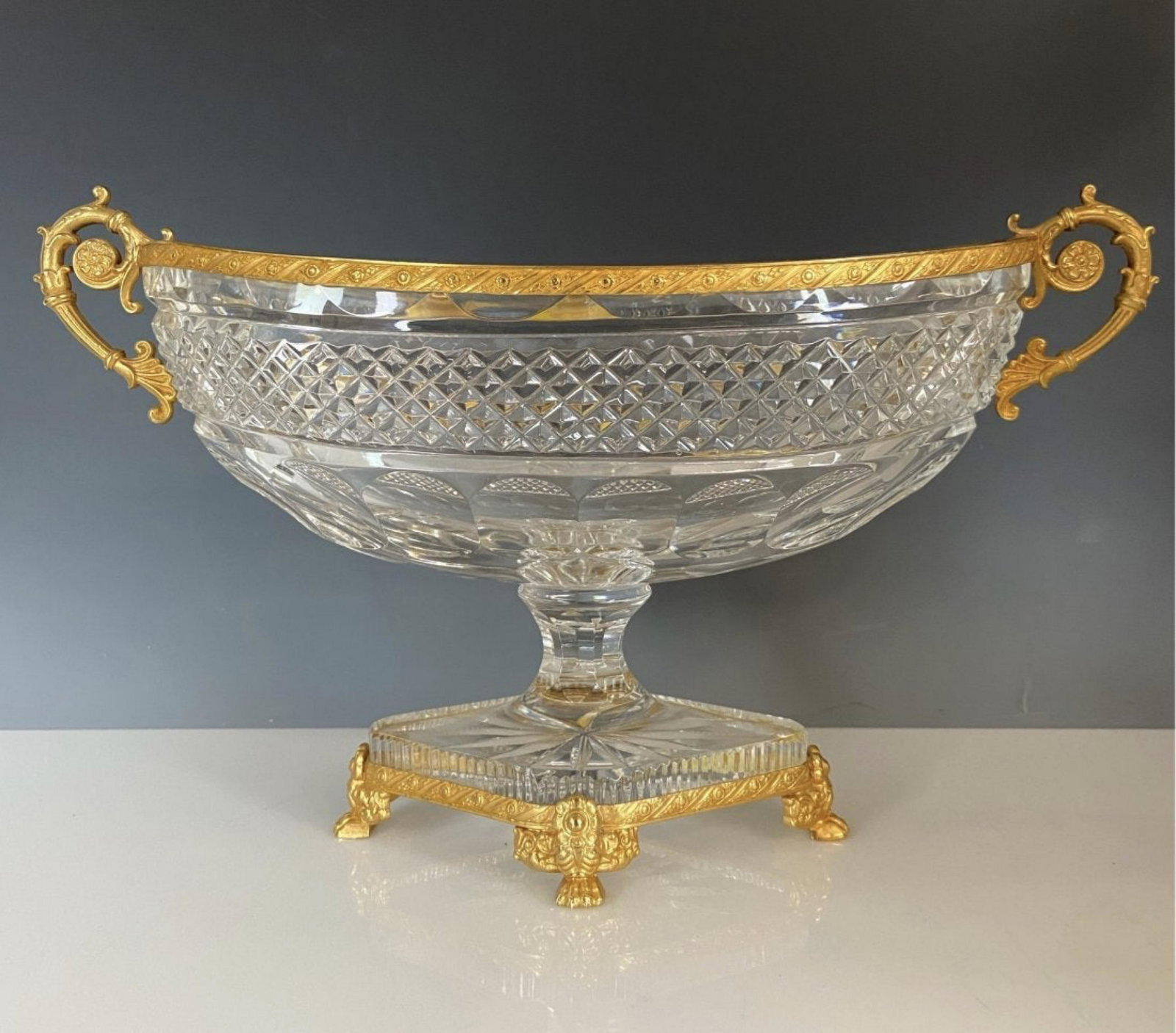 DORE BRONZE AND BACCARAT GLASS CENTERPIECE: Circa 1900. Measures 14 inches long. Good condition. Estimate $800-1.000