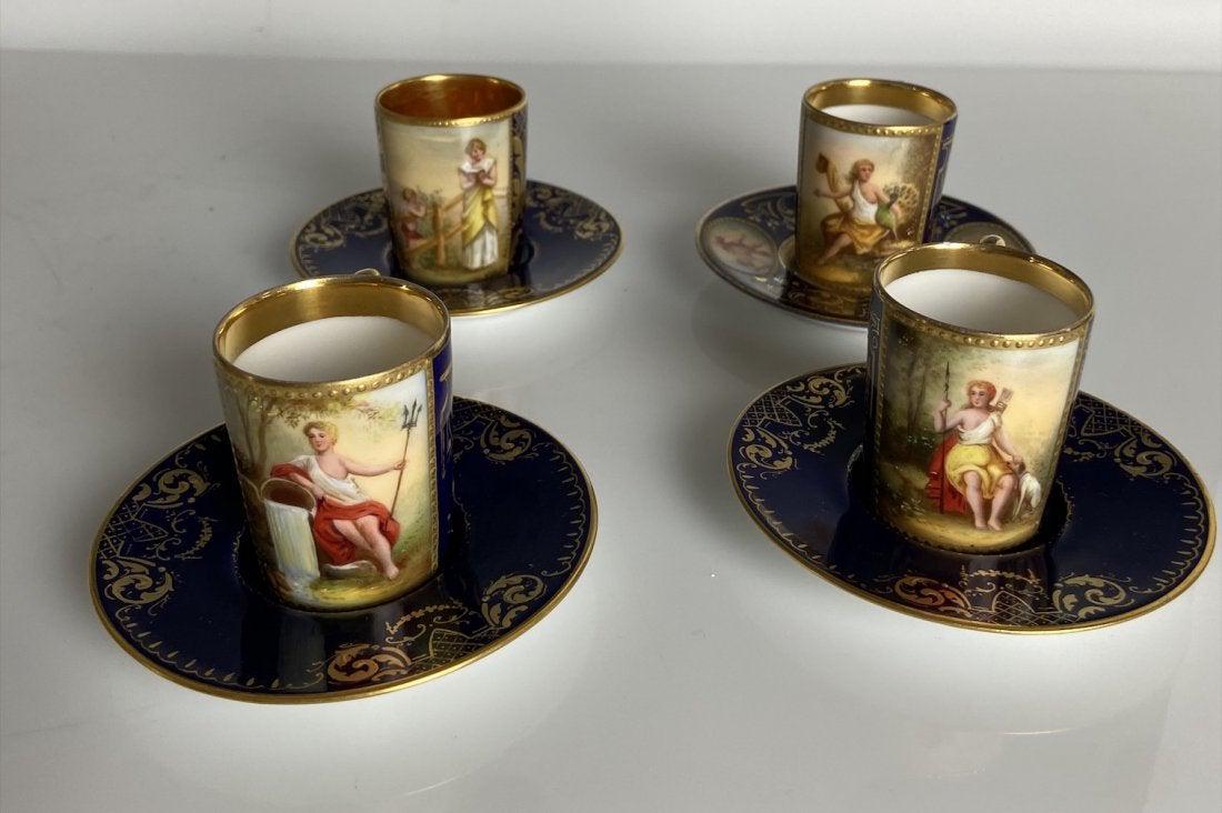 SET IF 4 ROYAL VIENNA DEMITASSE CUPS & SAUCERS: Circa 1900. All in good condition. Estimate $800-1.000