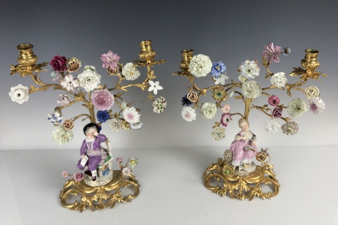 A PAIR OF DORE BRONZE MOUNTED MEISSEN CANDELABRA: Circa 1900. Measure 14 inches high, 13 inches wide. Estimate $3.500-4.000