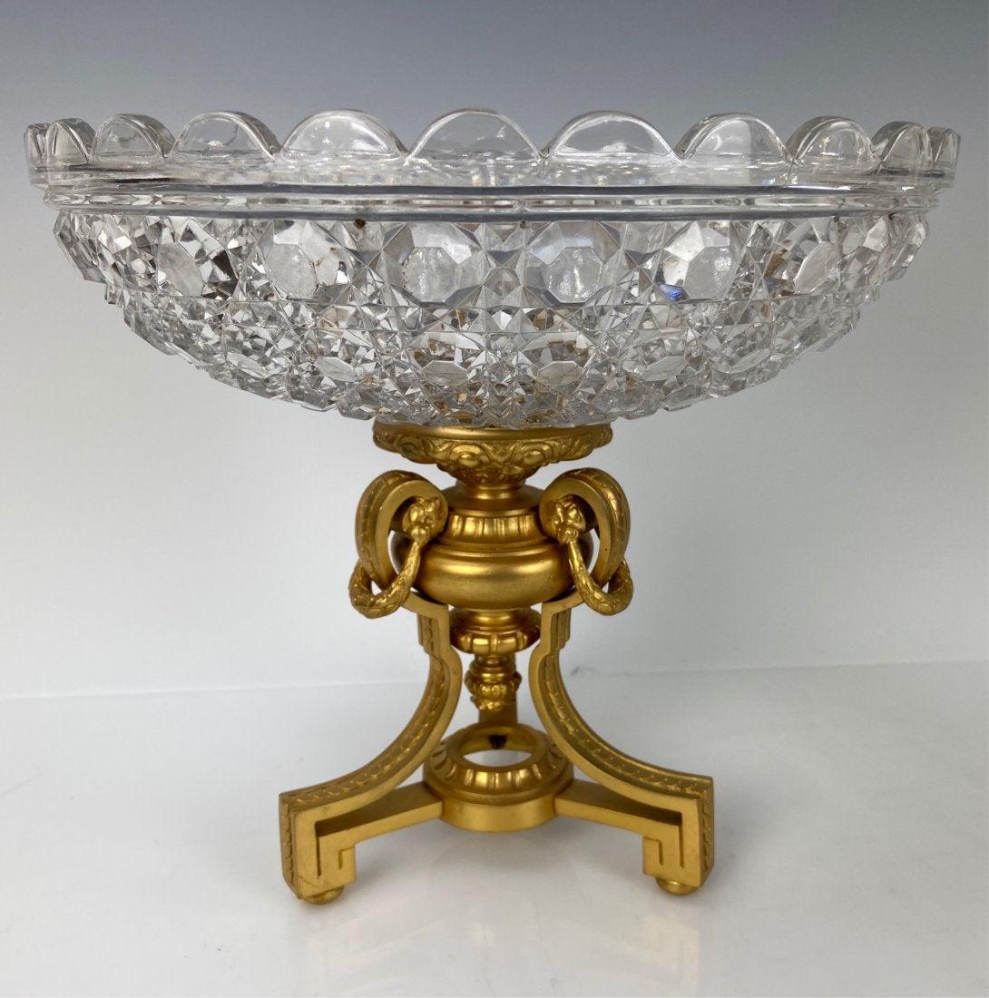 GILT BRONZE AND BACCARAT CRYSTAL CENTERPIECE: Circa 1880. Measures 10 inches diameter. Estimate $800-1.000