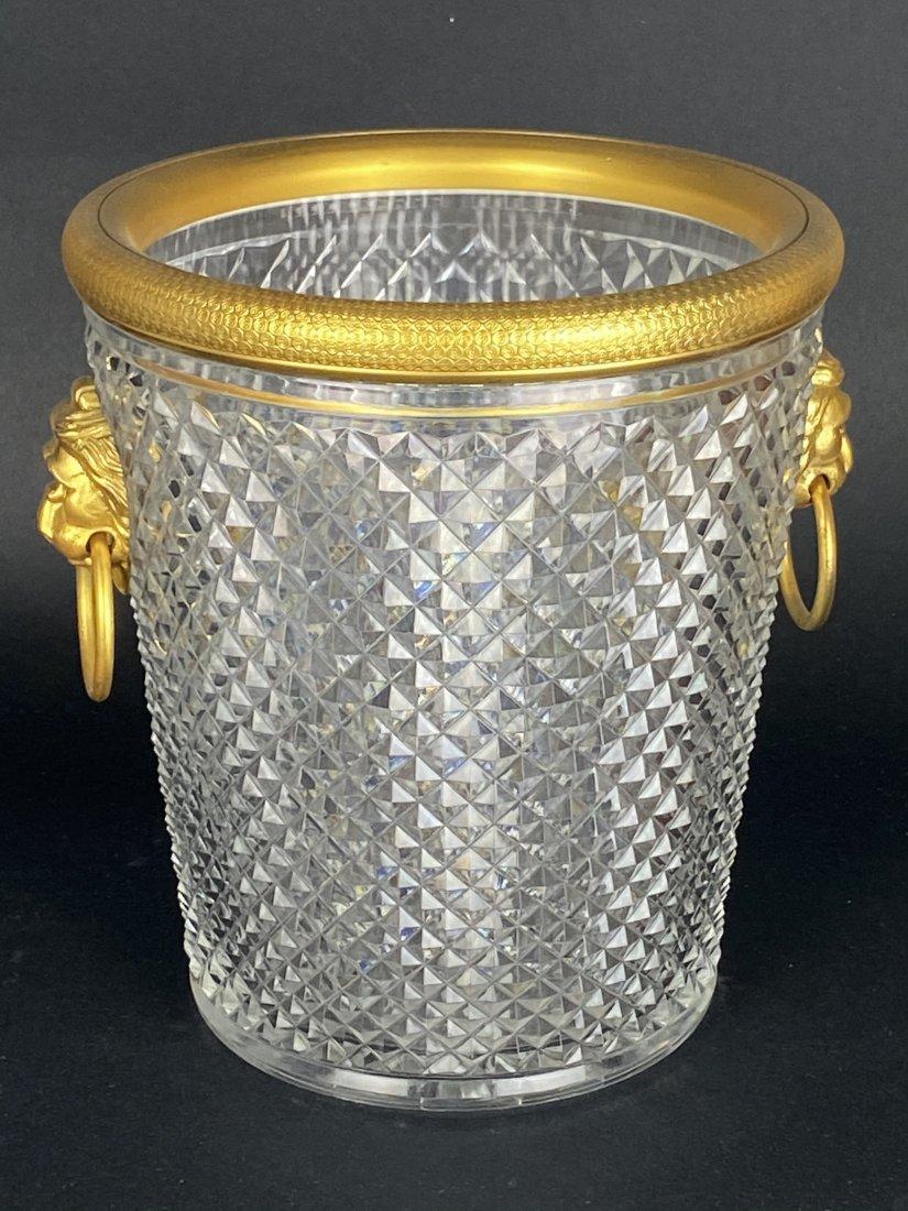 ORMOLU MOUNTED BACCARAT ICE BUCKET: Circa 1900. Measures 9.5 inches high. Good condition. Estimate $1.000-1.200