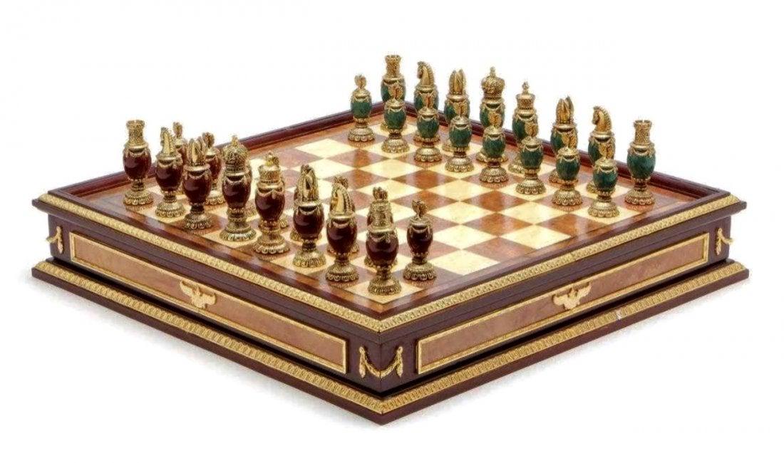 IMPERIAL FABERGE JEWELED CHESS SET: consisting of green and burgundy jeweled body chess set with 24k gold plated headpieces, inspired by the jeweled eggs of Faberge, produced by the Franklin Mint and designed by The House of Faberge, ho